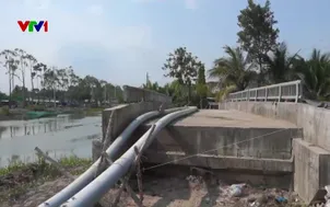 Qua sông vẫn khó dù cầu đã có