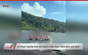 Xử phạt nhóm phụ nữ ngồi chụp ảnh trên đèo Hải Vân