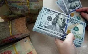 Giá USD trong nước bật tăng sau quyết định của Fed