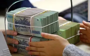 Hơn 14 triệu tỷ đồng gửi vào hệ thống ngân hàng