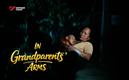 In Grandparents' Arms | The Lens