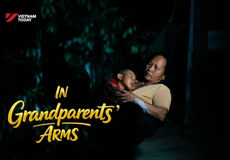 In Grandparents' Arms | The Lens