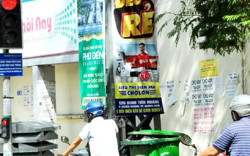 TP.Quảng Ngãi: Tràn lan việc treo, dán quảng cáo trái quy định