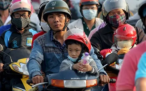 Bắt buộc đội mũ bảo hiểm đối với học sinh từ 6 tuổi