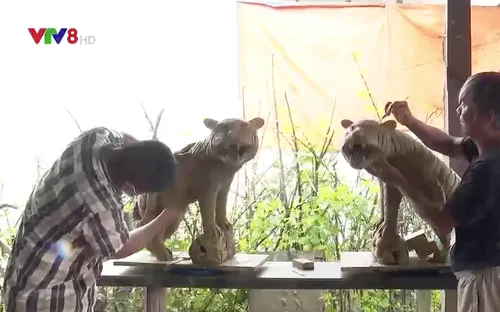 Người thổi hồn vào tượng hổ