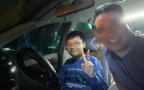 Công an làm việc với người đàn ông "cho con trai 12 tuổi cầm lái ô tô để quay video"