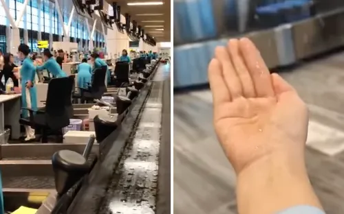 Nước mưa lại chảy từ trên mái xuống sàn Nhà ga T3