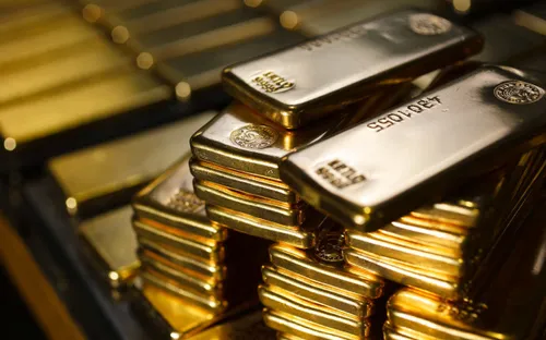 Vàng giảm nhẹ trước sức ép từ USD, giới đầu tư dõi theo phản ứng của Iran