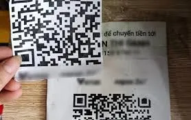 Dán đè mã QR thanh toán để chiếm đoạt tiền, hai thanh niên bị bắt