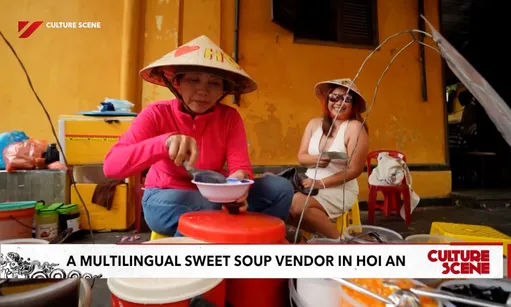 A multilingual sweet soup vendor in Hoi An