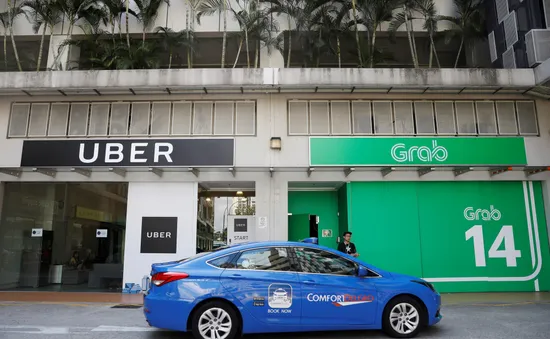 Thương vụ Grab mua Uber có dấu hiệu vi phạm pháp luật