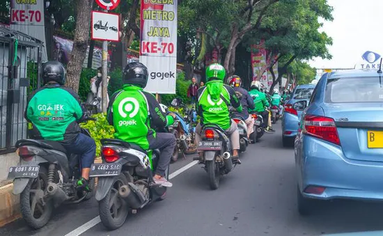 Softbank thúc đẩy đàm phán sáp nhập Grab với Gojek