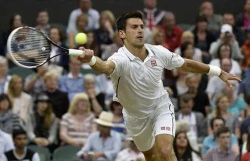 Wimbledon 2014: Thắng "hú vía" Cilic, Nole đụng Dimitrov tại bán kết