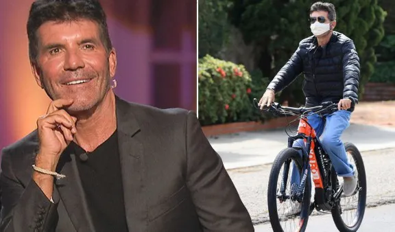 Simon Cowell đang tập đi sau tai nạn ngã xe đạp điện gãy lưng
