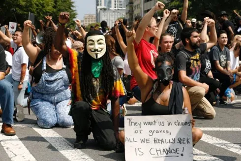 Protesters march near NFL game after release of Charlotte shooting video