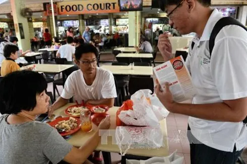 Singapore reviews regulation isolating potential Zika-infected patient