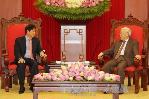 Party chief welcomes Singaporean Minister