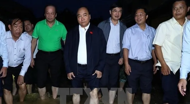 Prime Minister Nguyen Xuan Phuc visits flooded Hoi An