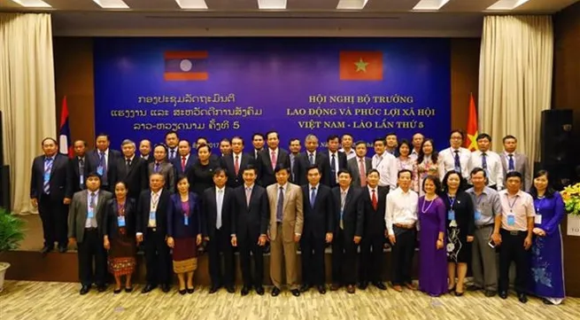 Enhanced labor, welfare ties with Laos