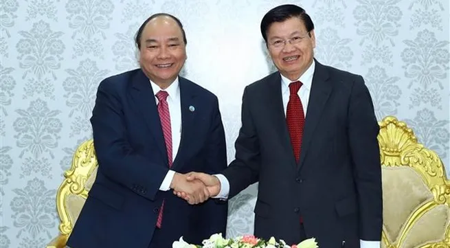 Vietnamese, Lao PMs visit Star Telecom