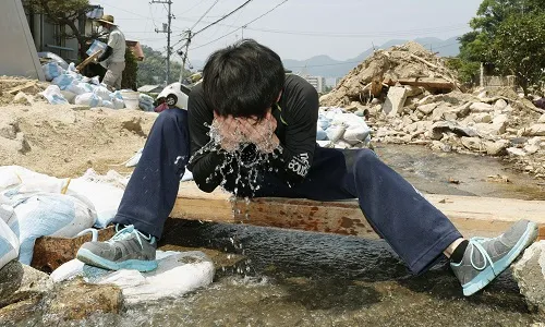 At least 12 dead, 10,000 hospitalized as heat wave engulfs Japan