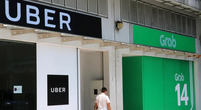 Grab, Uber fined nearly 10 million USD