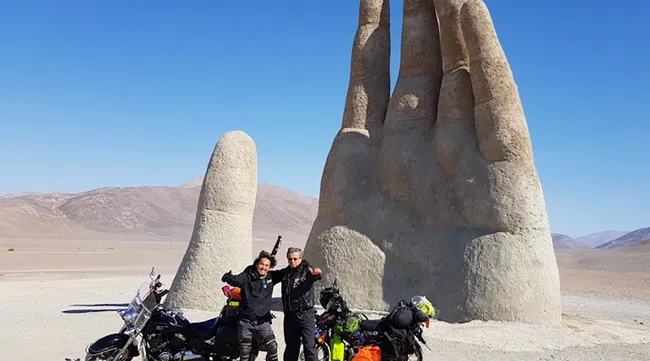 Vietnamese backpacker traveling around the world by motorbike