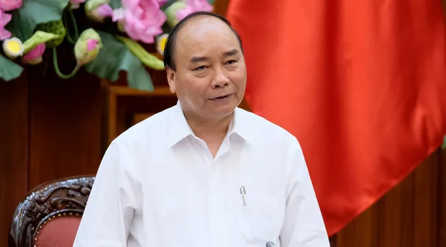 PM urges stronger efforts to build e-government