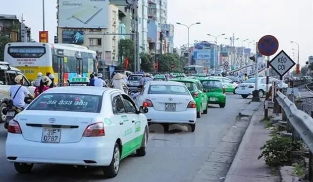 Hanoi’s taxis may have same colours by 2026