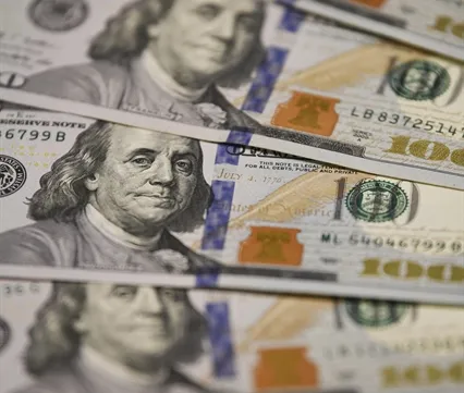 US Fed cuts key interest rate to 'insure' against global uncertainties