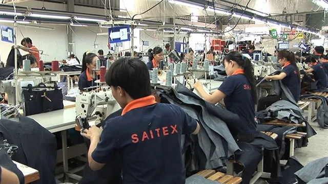 High-level Swiss delegation visits garment factory in Đồng Nai