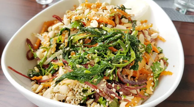 Wild black-jack flowers, an intriguing salad addition in Vietnam mountains