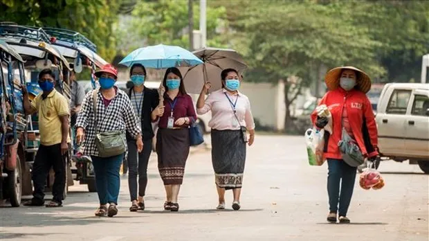 Vietnamese in Laos advised to follow local COVID-19 regulations