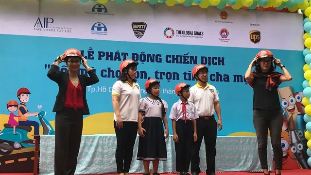 Traffic safety campaign tells school kids to wear helmets