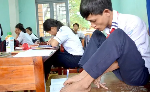 The boy who is a dab hand, with his feet