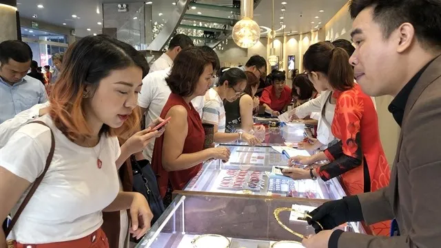 Gold shops prepare for God of Wealth Day rush