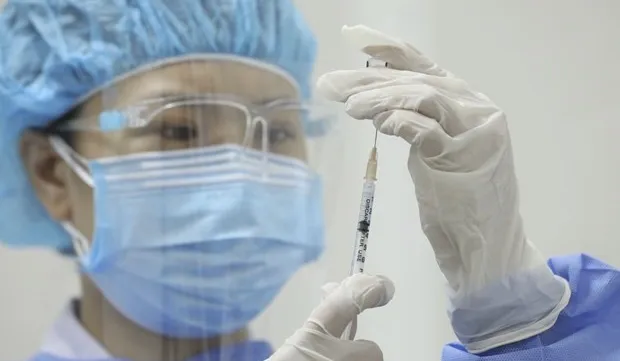 Vaccination priority given to children not attending school due to lockdown: Health Minister