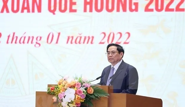 PM meets OVs joining “Xuan Que huong” programme