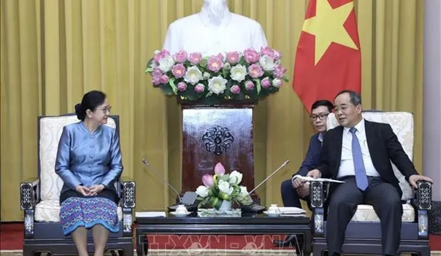 Presidential Offices of Vietnam, Laos enhance ties