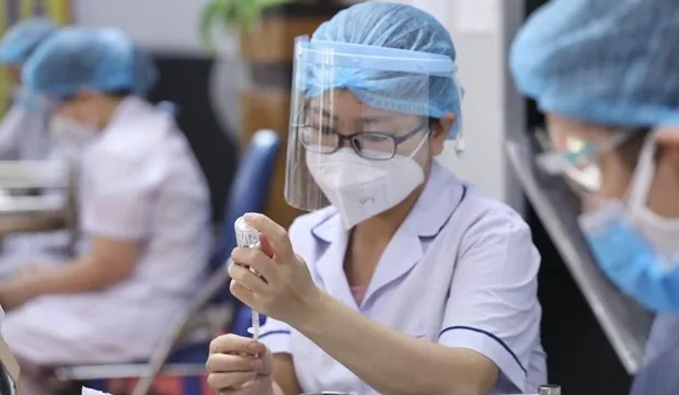 Hanoi steps up vaccination amid increasing COVID-19, dengue fever cases