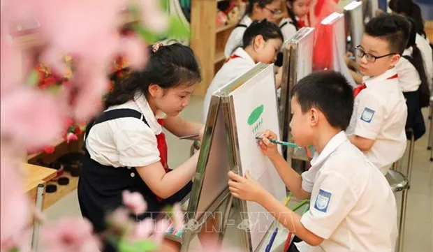 Hanoi to further boost investment in education, training