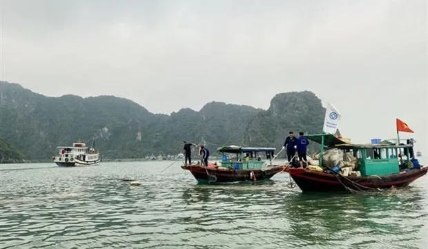 Floating styrofoam buoys in Ha Long Bay collected
