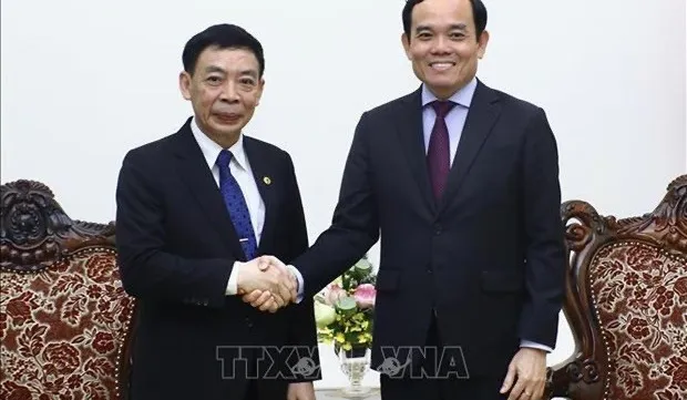 Deputy Prime Minister Tran Luu Quang receives Lao Minister of Home Affairs