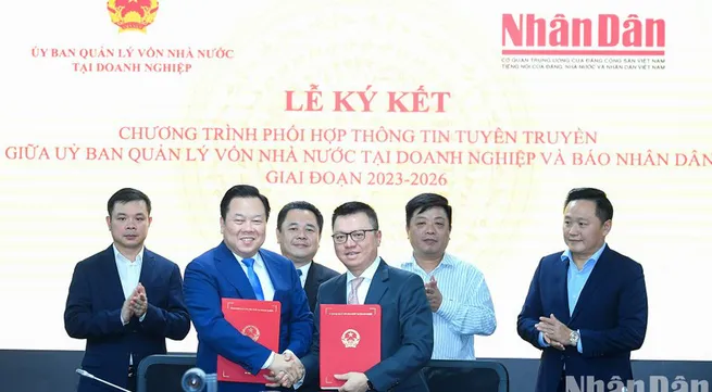 Nhan Dan signs information cooperation with State Capital Management Commission