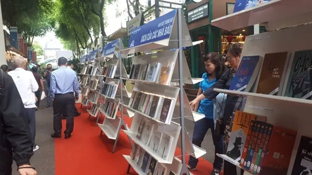 Journalists honoured with book fair in HCM City