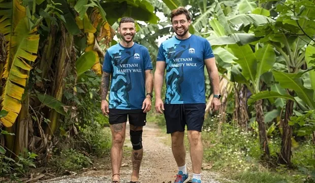 Two expats complete 2,000-km walk to raise funds for Vietnamese underprivileged children