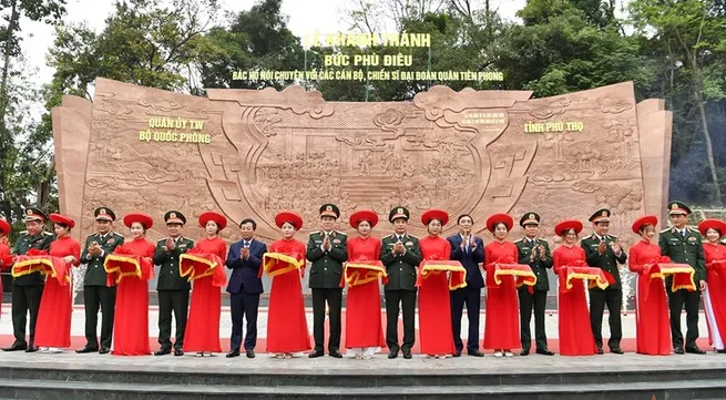 Bas-relief sculpture featuring President Ho and soldiers of 308 Infantry Division inaugurated