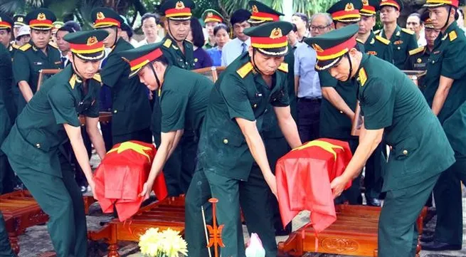 Quang Binh holds memorial, reburial services for martyrs' remains