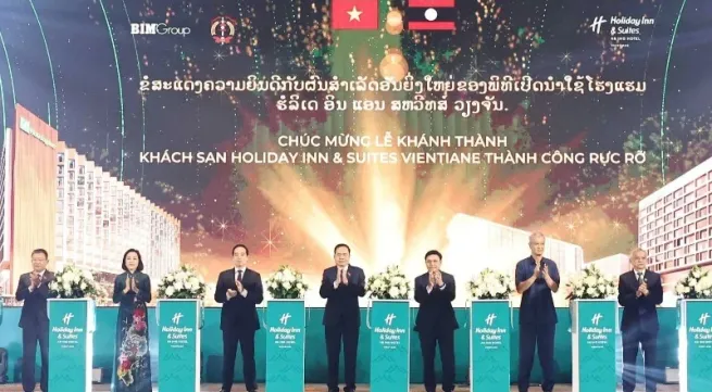 Vietnamese and Lao top legislators attend inauguration of internationally branded project in Laos