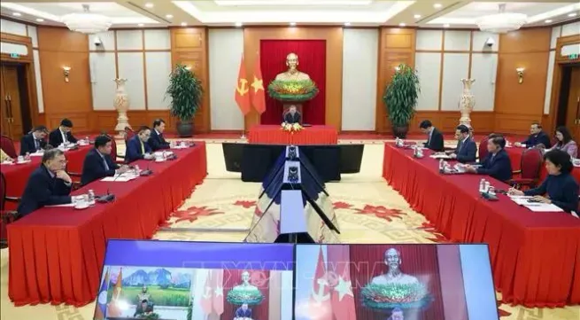 Party chief holds phone talks with Lao top leader